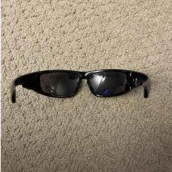 Image of the fifth object which is a pair of sunglasses