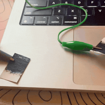 I cut up the painted sheet into two buttons and opened a file from activity 1 where I could resize a shape and shrink it uppon clicking the up and down arrow.
